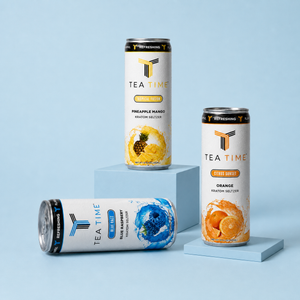 Tea Time Tropical Fusion, Citrus Sunset, and Blue Razz cans on blue blocks